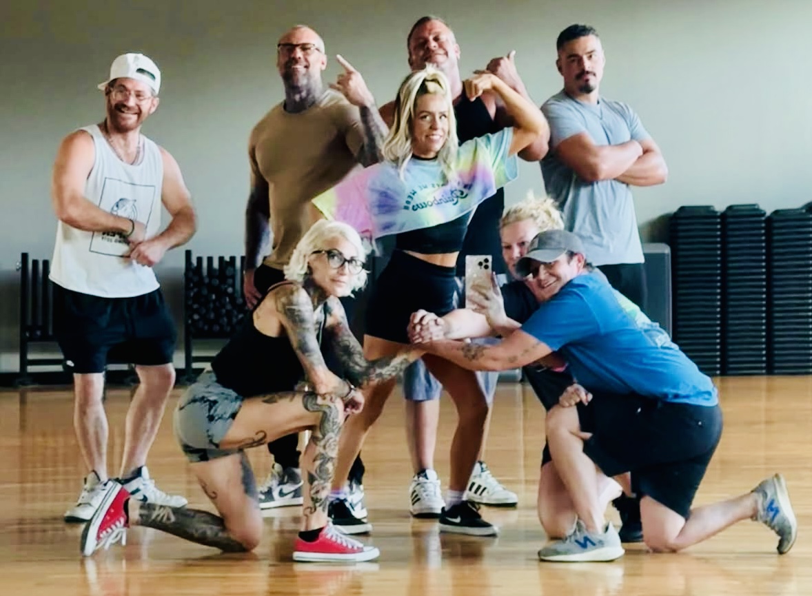 The HIS House crew together at the gym after a group workout